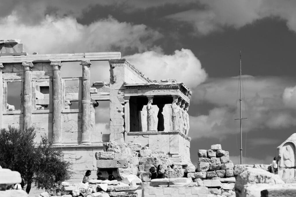 Black and white photo of the Erechtheion on the Acropolis, Athens, Greece.