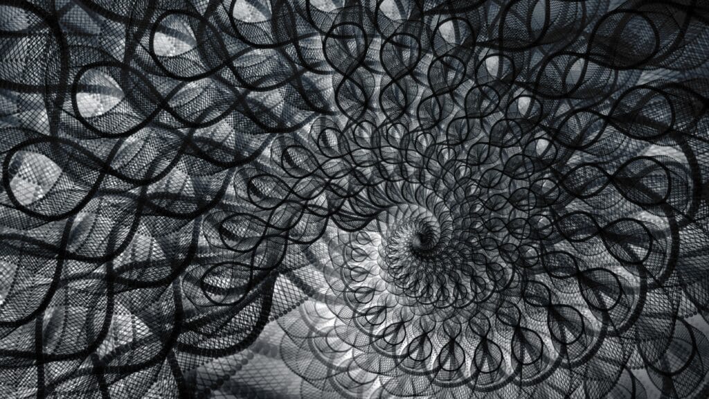 Abstract black and white spiral with geometric and repetitive patterns, perfect for artistic and creative backgrounds.